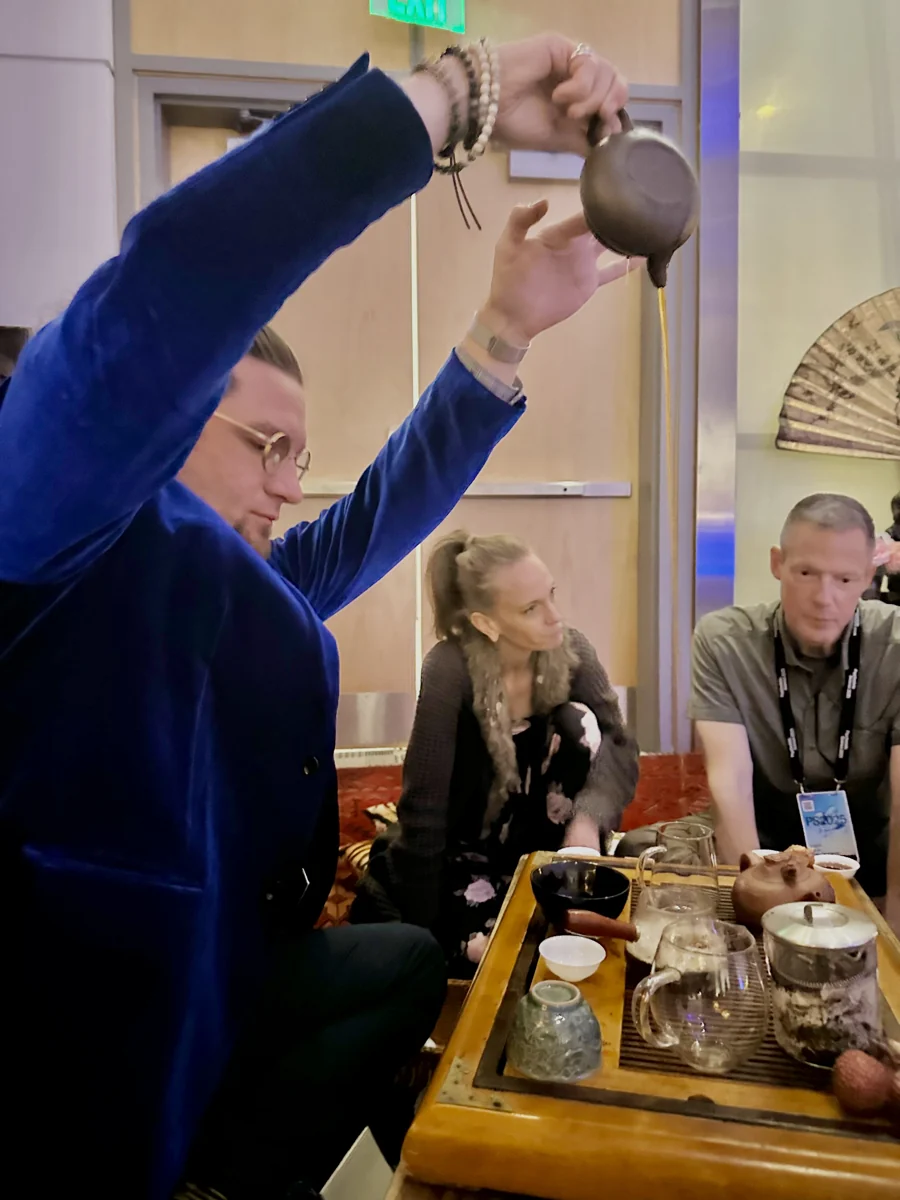 Constantine pouring Chinese tea